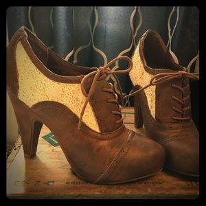 Brown and white lace booties